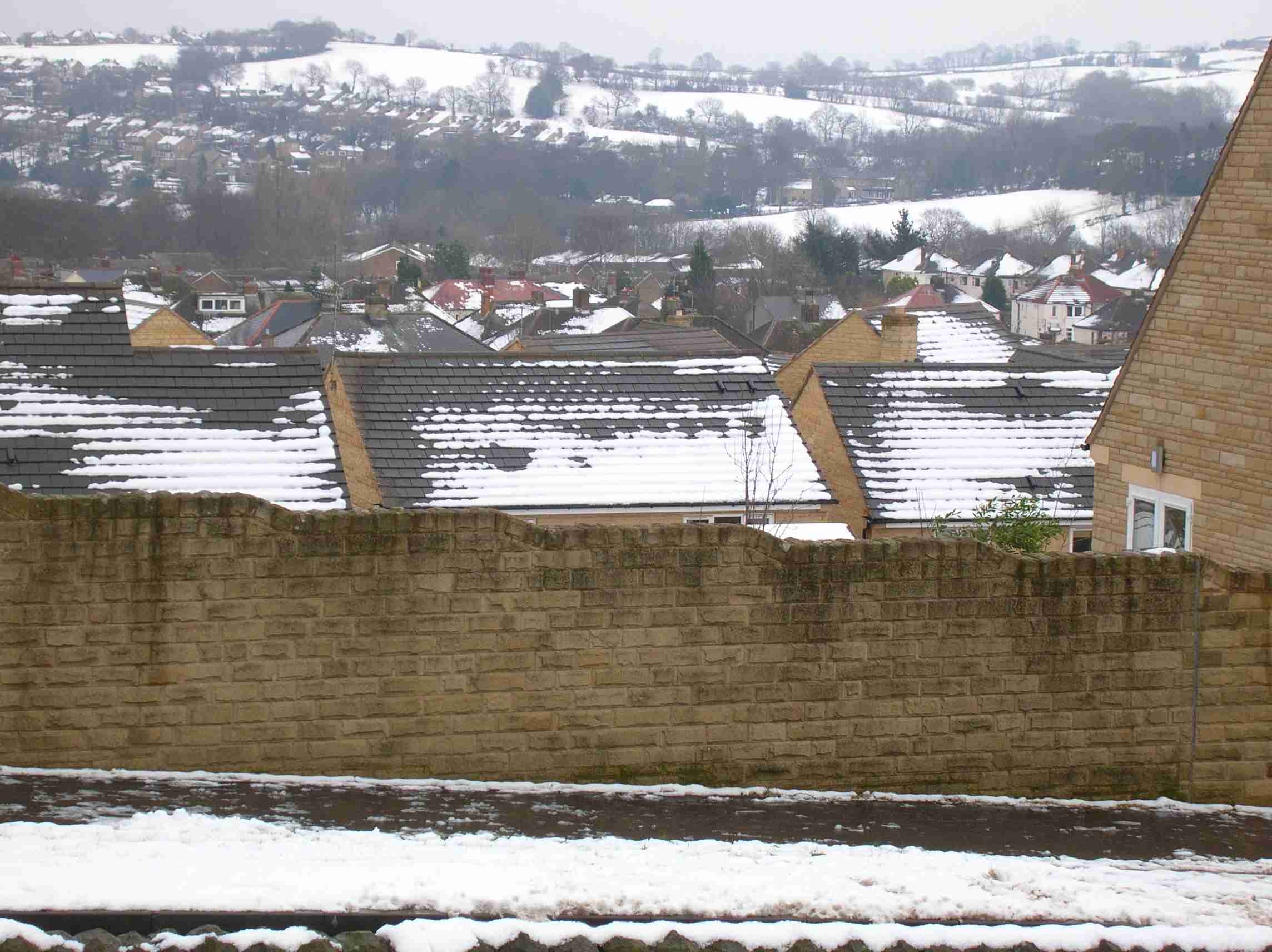 Looking from the garden of TOTLEY HALL across the roofs of TOTLEY HALL ESTATE towards BRADWAY